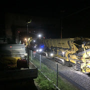 Lentry LED jobsite light tower works from inside the truck bed, view 1