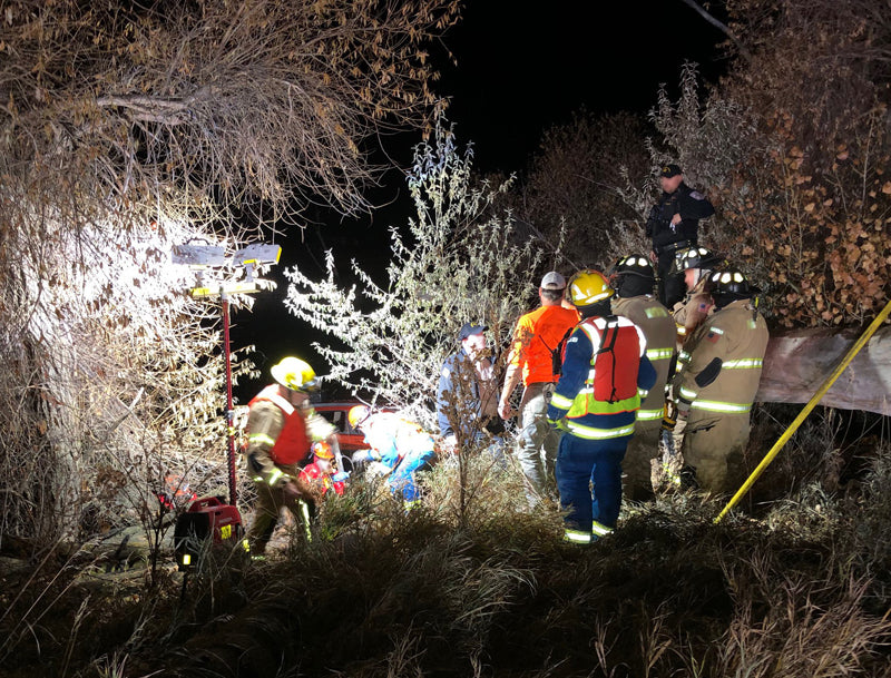 A 2-Headed LED Lentry Light allows rescue crews to search the area of a partially submerged vehicle.