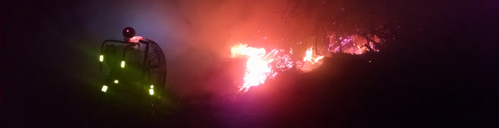 Nighttime view of brush burning fan