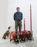 The dog and James next to "light-less" models to show relative height, poles retracted.