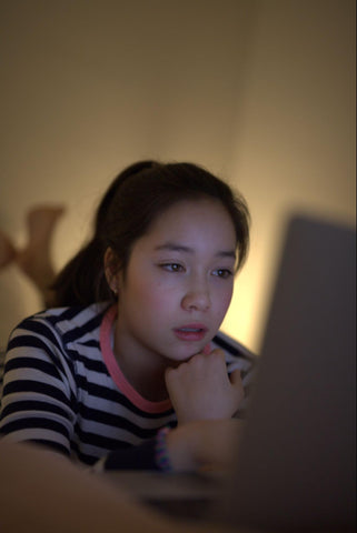 Teen in front of the computer