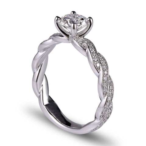 Custom designed platinum solitaire and diamond ring created by the design studio Davidson Jewels