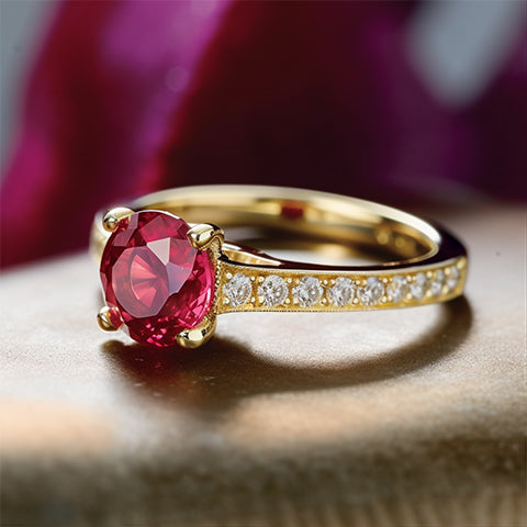 Ruby and diamond engagement ring in 18k yellow gold