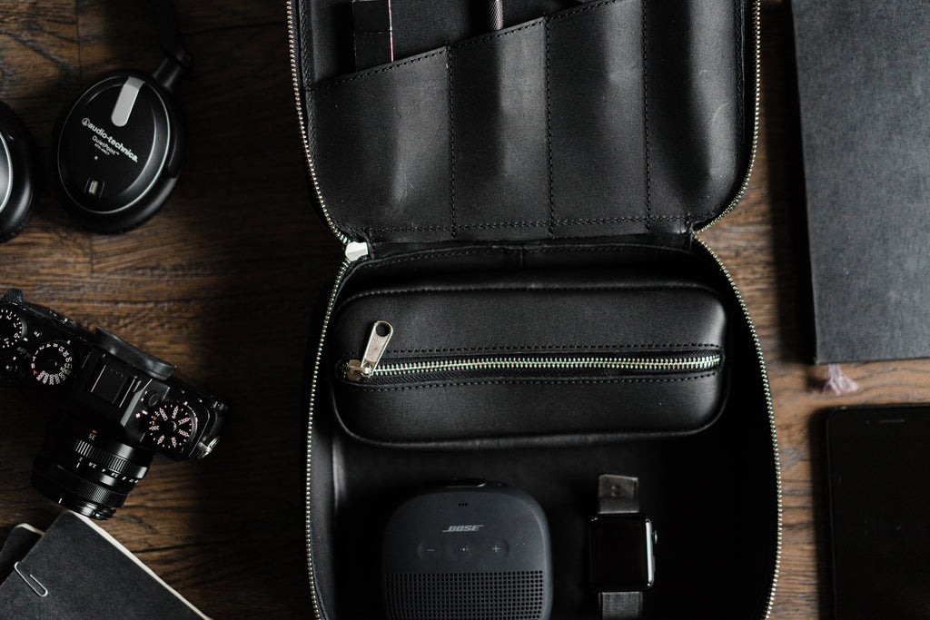 Larger tray for speakers, larger toiletries, and headphones