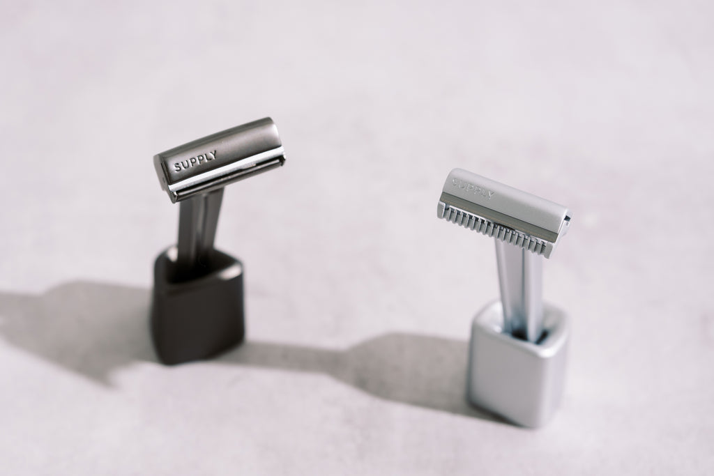 Supply SE and Supply Pro in Razor Stands on Gray Background