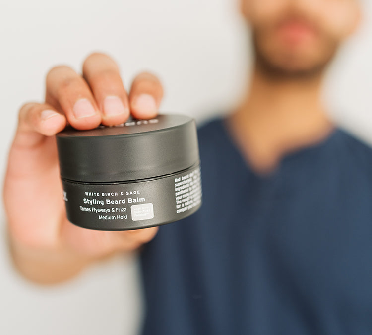 Man holding Supply Beard Balm