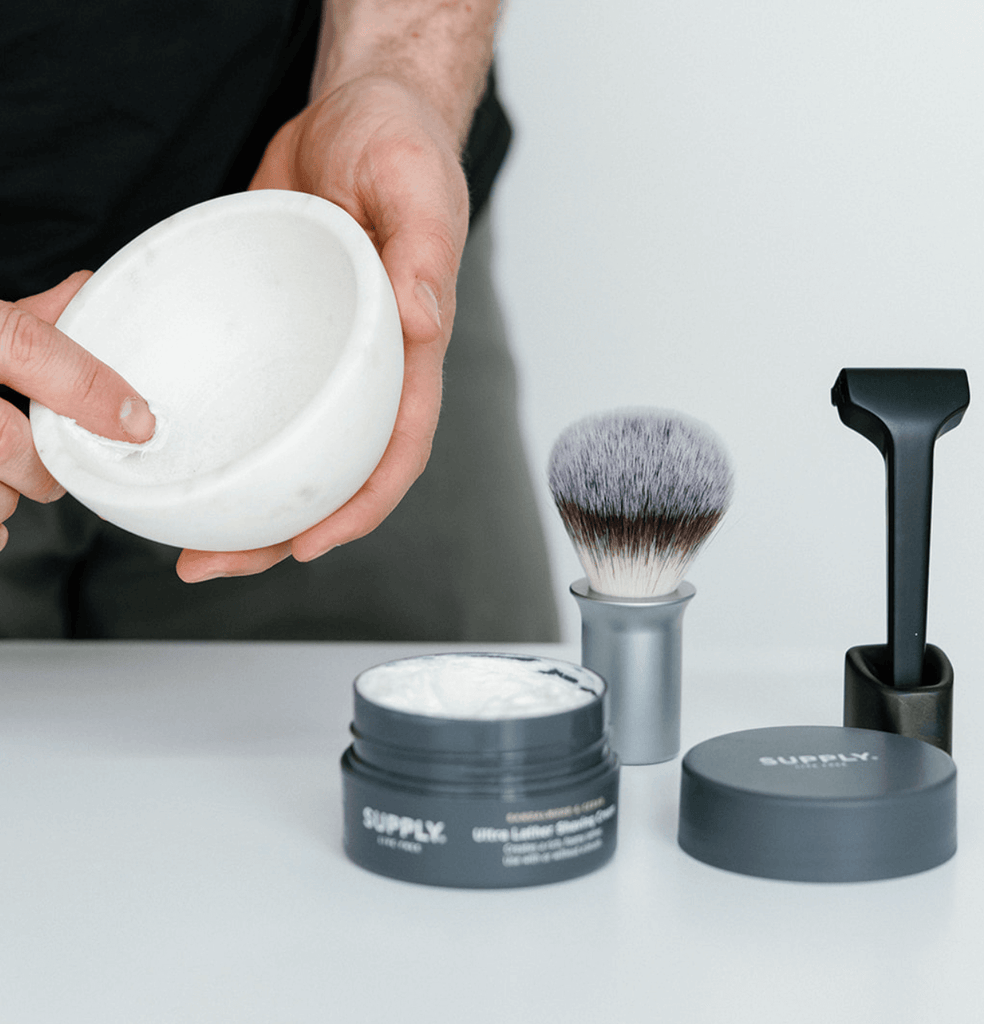 man using marble shave bowl