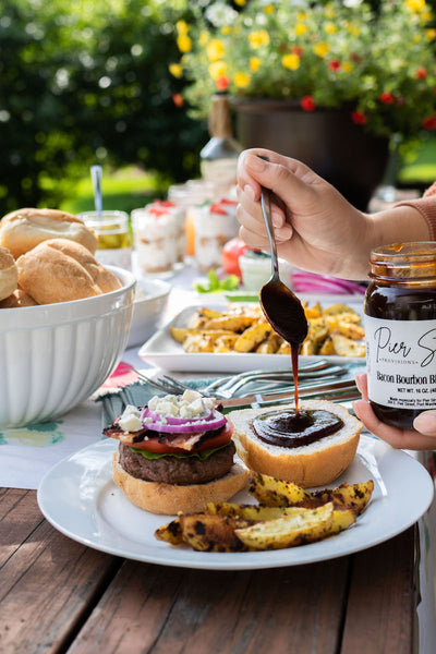 Add some bbq sauce to your ultimate backyard bbq burger. Get great sauces and dips from Pear & Simple gift shop in Port Washington, Wisconsin.