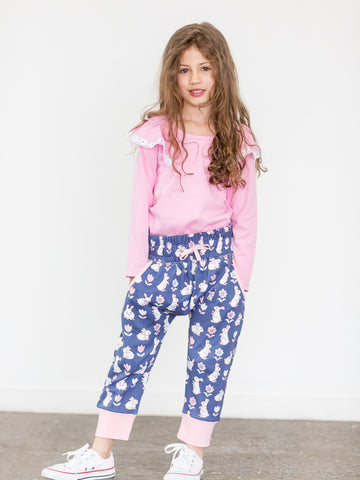 Girl in blue bunny pants