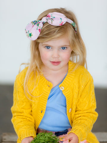 Girl in yellow cardigan