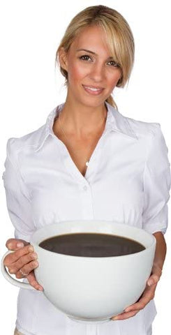 lady holding a coffee mug, largest coffee mug, lady wearing white polo