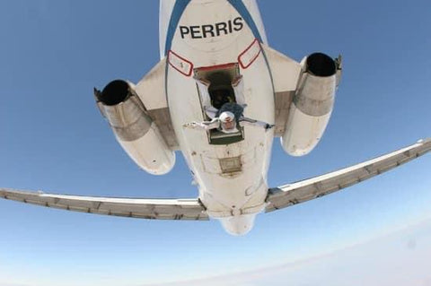 (guys jumping, from outside the Perris plane) An old DC-9 is used by the Perris Corporation for professional jumpers, making use of the ventral stairs