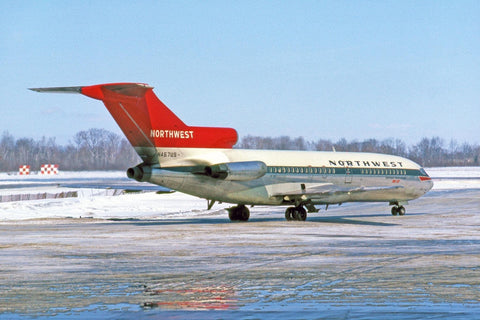 (plane taxiing with snow) The actual aircraft, tail number N467US, a Boeing 727-151 delivered to Northwest Orient Airlines in 1965, retired in 1985 after also flying for Piedmont Airlines and Key Air, and scrapped in Greenwood Mississippi in 1992
