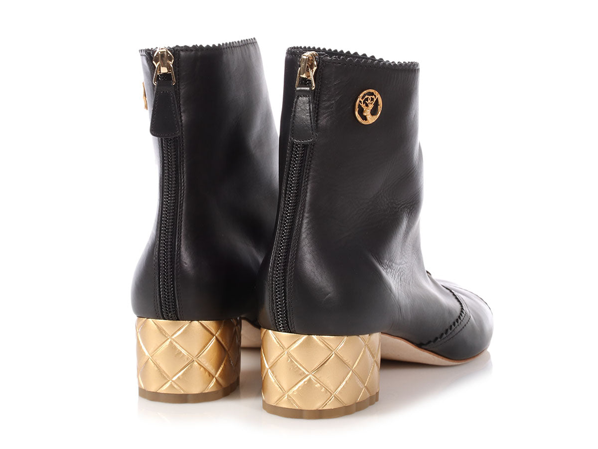 chanel quilted boots