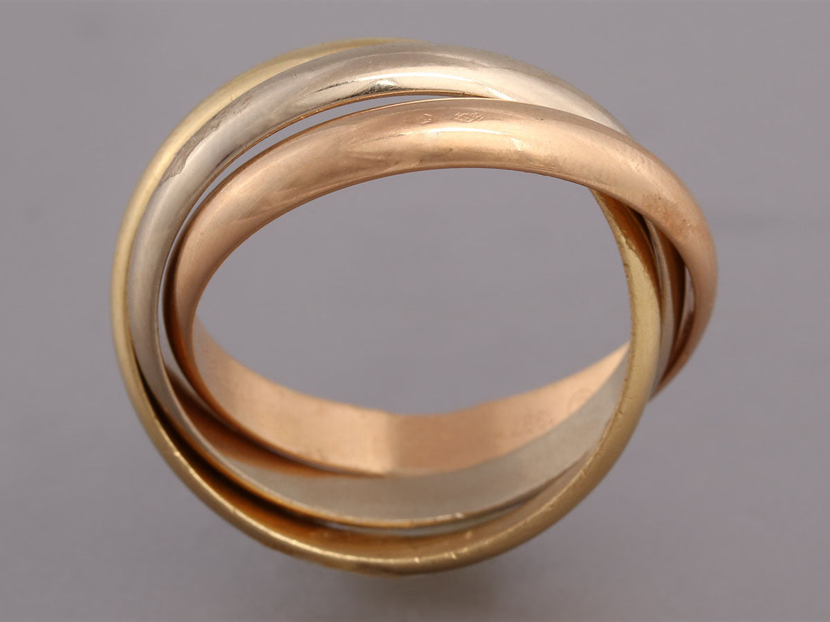 cartier tri color gold rolling ring