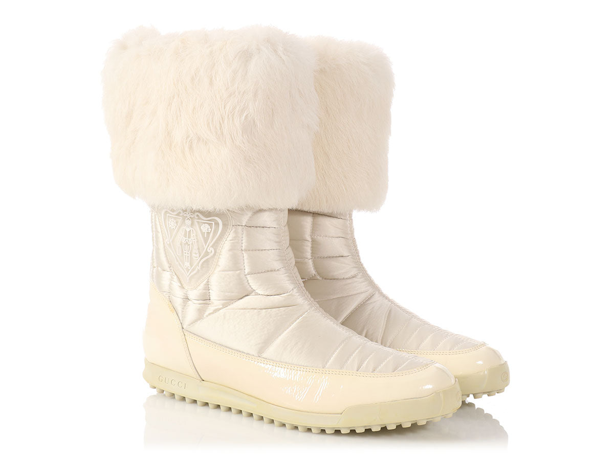 white gucci boots with fur