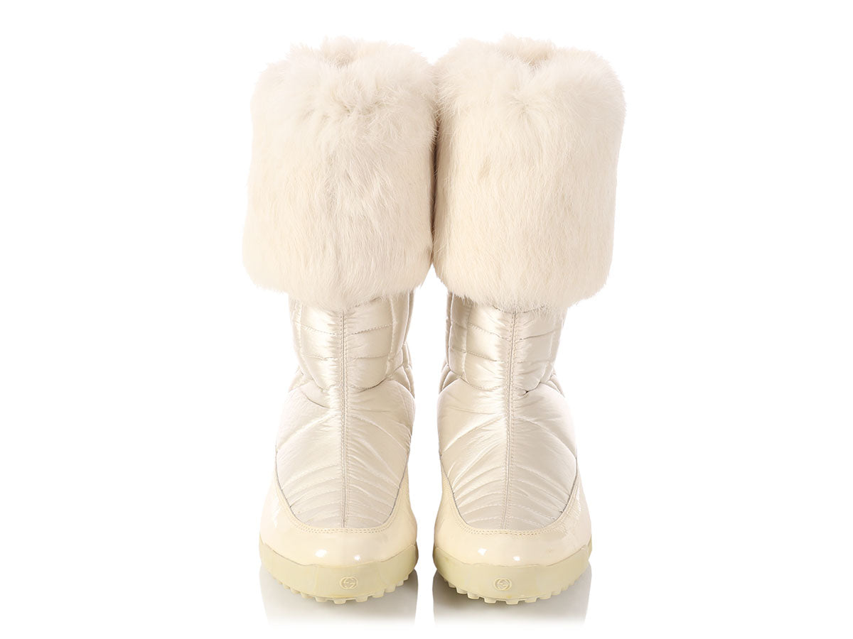 white gucci boots with fur