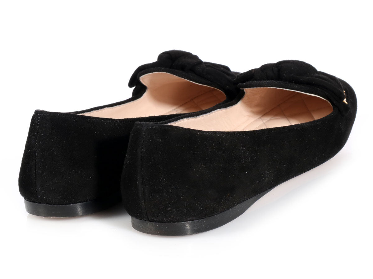 black suede flats with bow