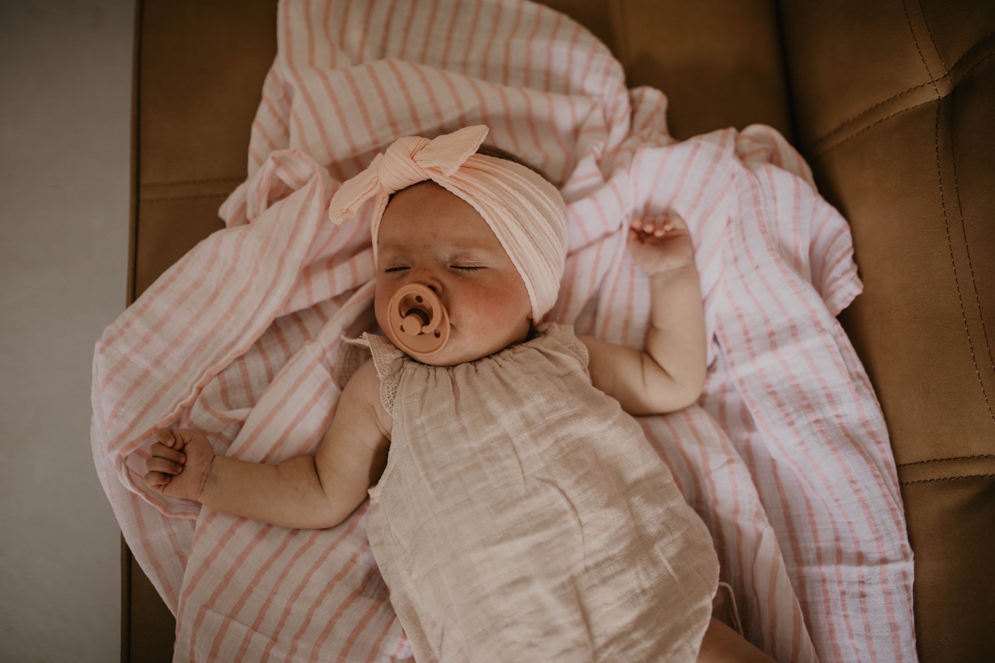 Baby Laying on Swaddle Blanket