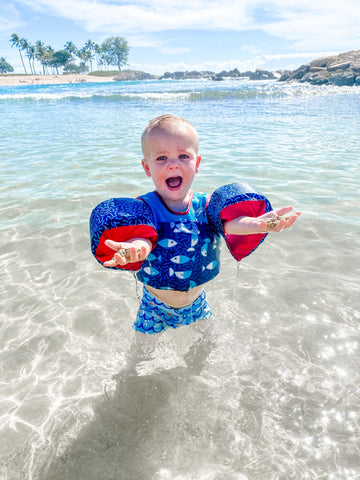 at the beach with a toddler