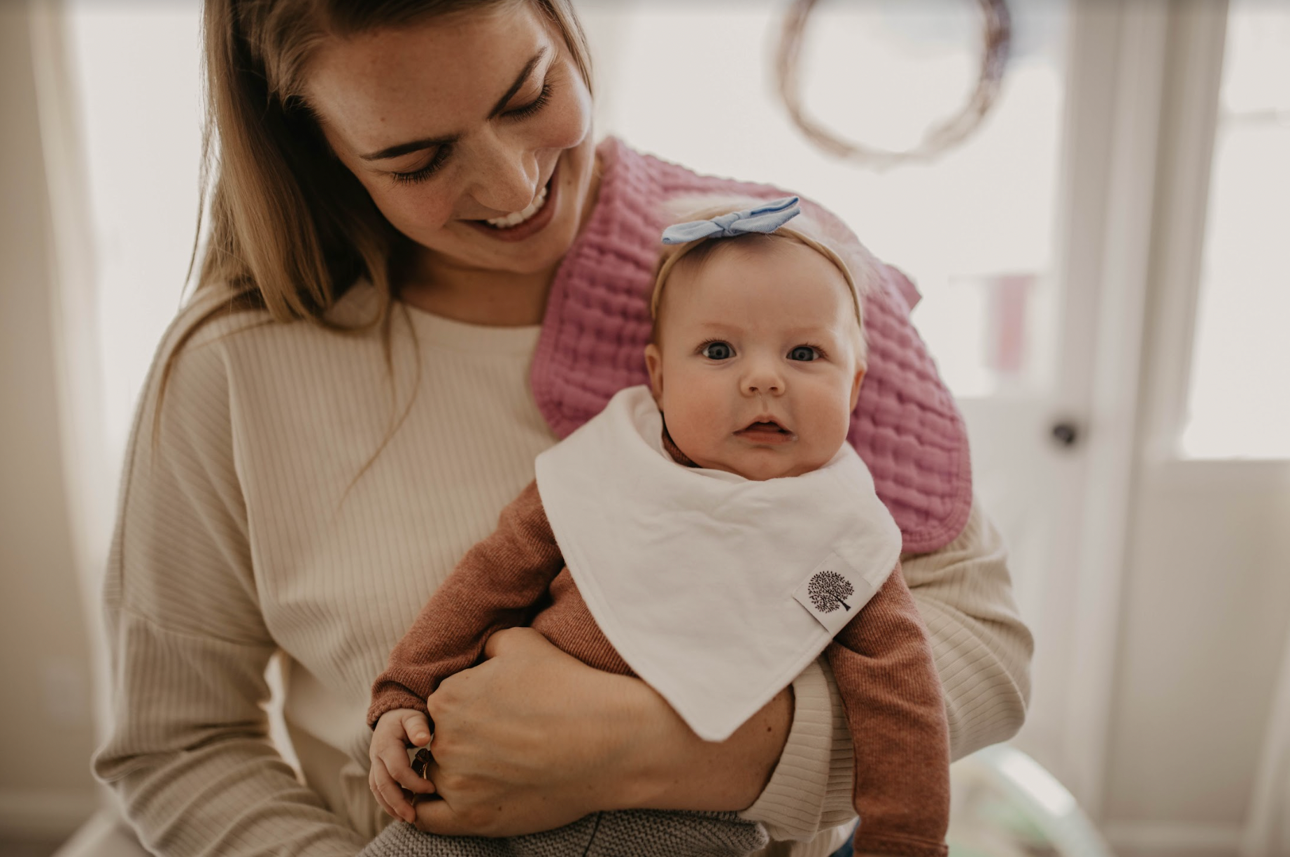 Mom Holding Baby with Baby Accessories