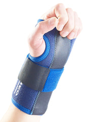Hand wearing Neo G Stabilized Wrist Brace