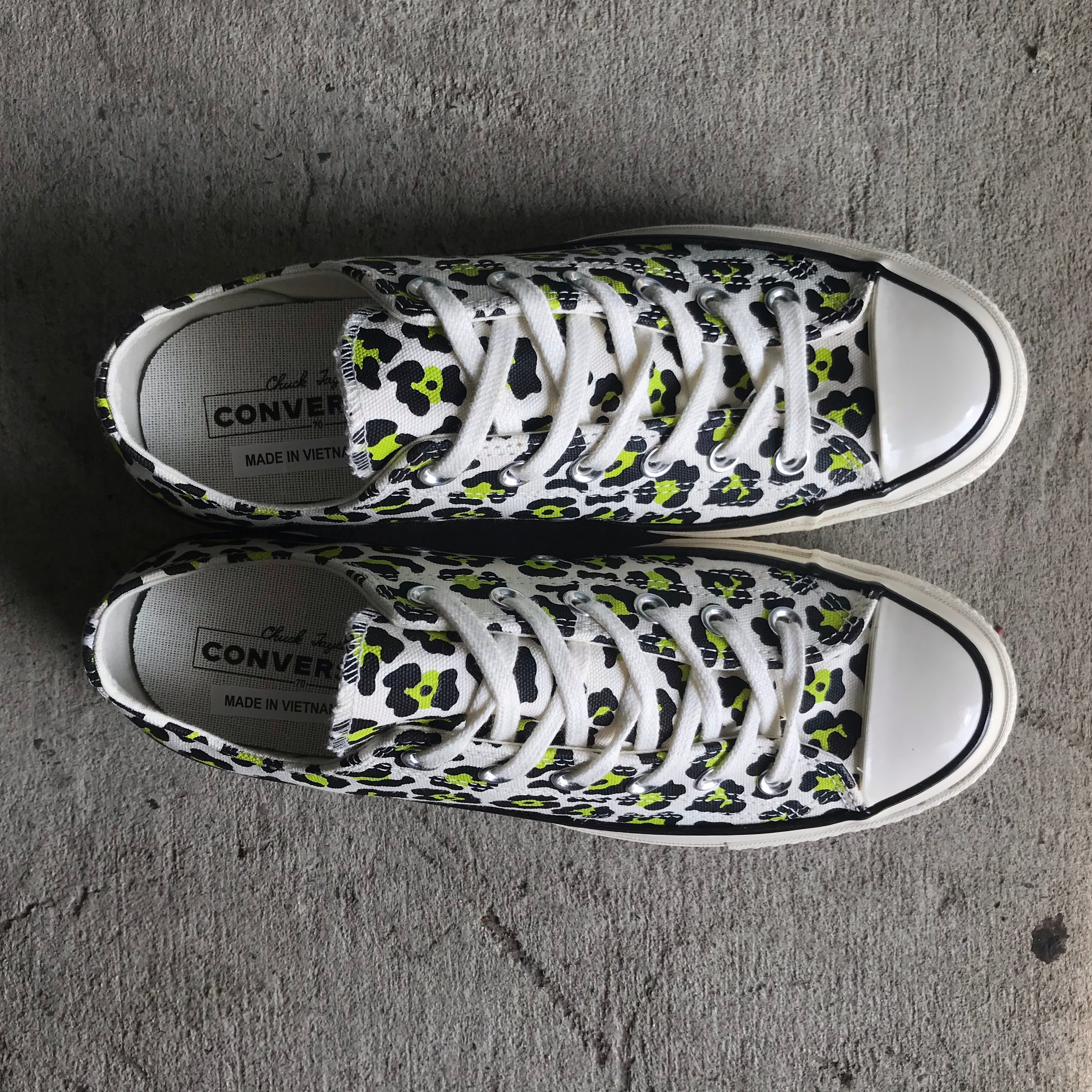 black and lime green converse