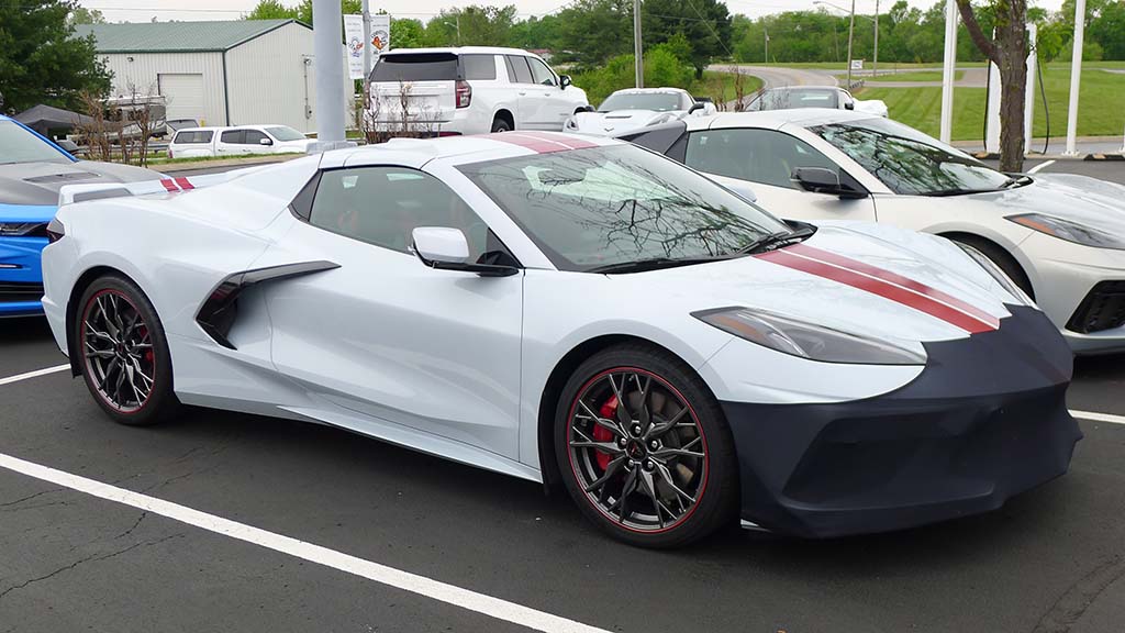 A C8 Corvette Stingray in Arctic White with a front bra protector on