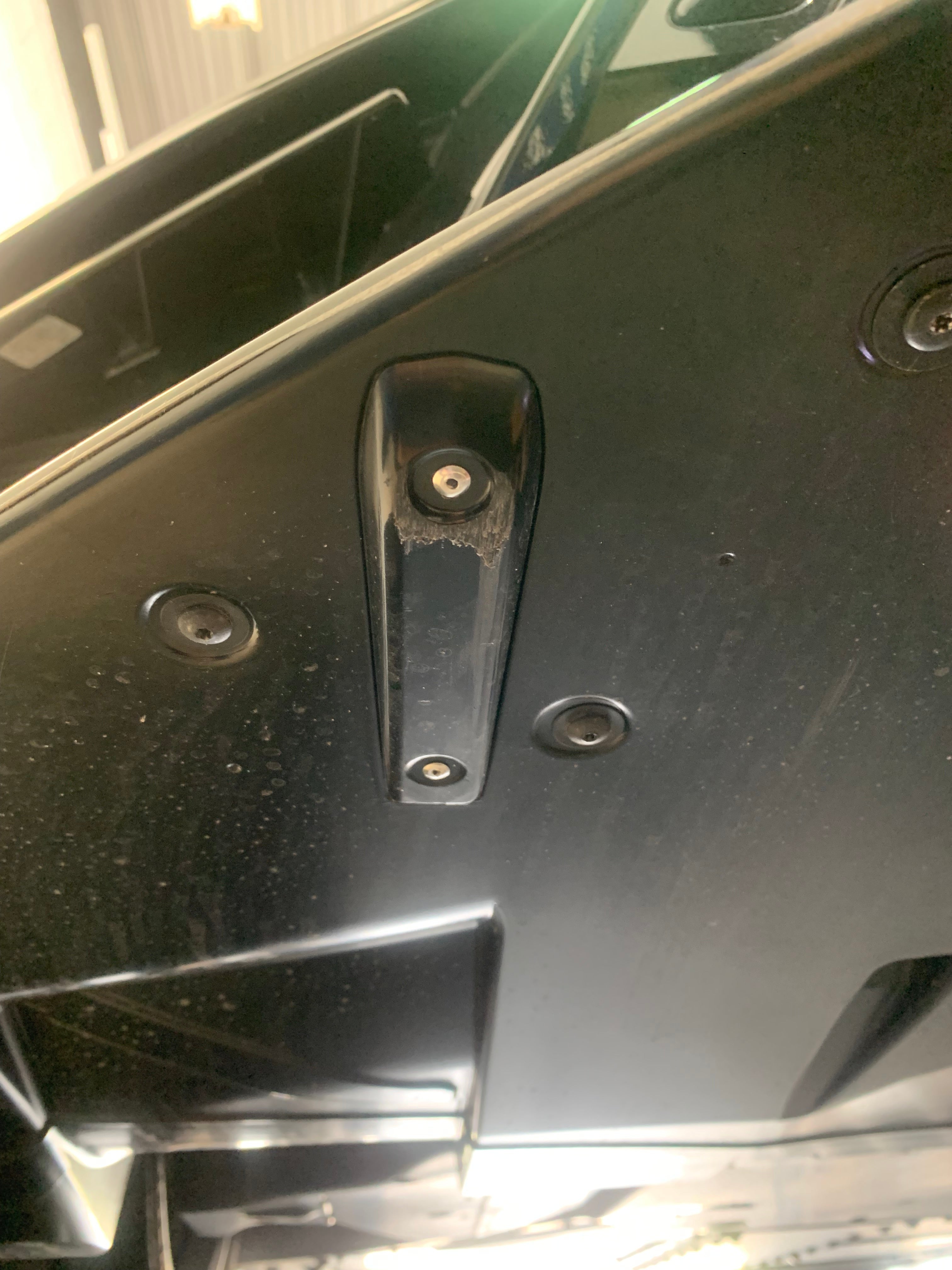 close-up of the ACS C8 Undertray Scrape Guard showing signs of wear