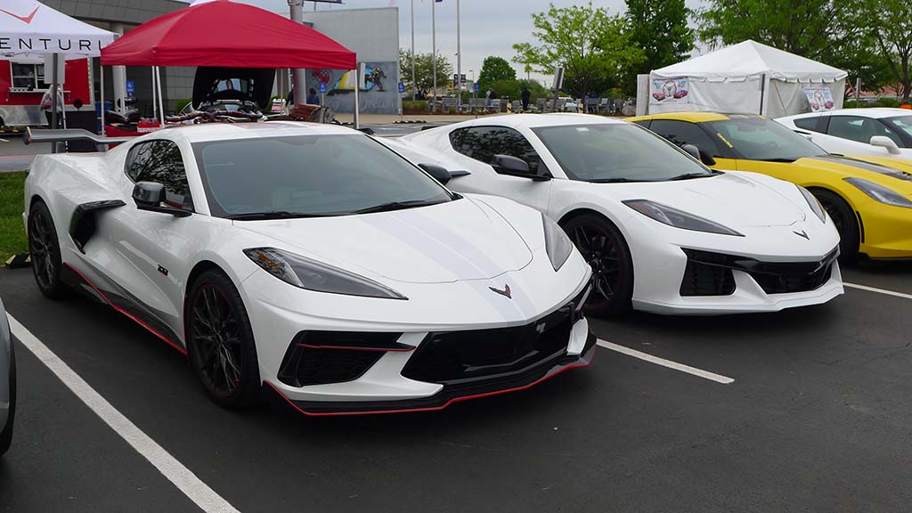 A C8 Corvette Stingray in Arctic White next to a C8 Corvette Z06 in Arctic White