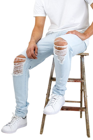 guy with ripped jeans