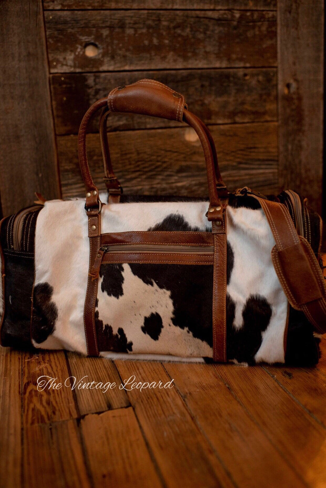 myra cowhide duffle bag