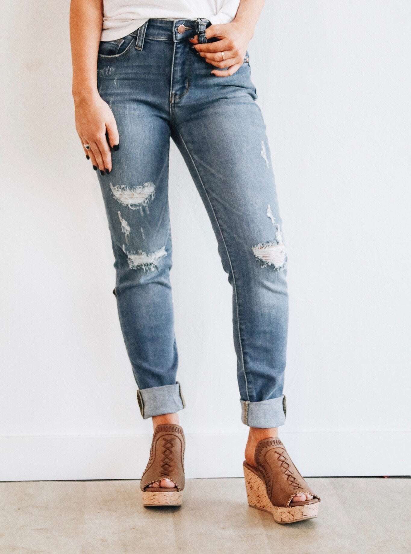 ripped light wash mom jeans