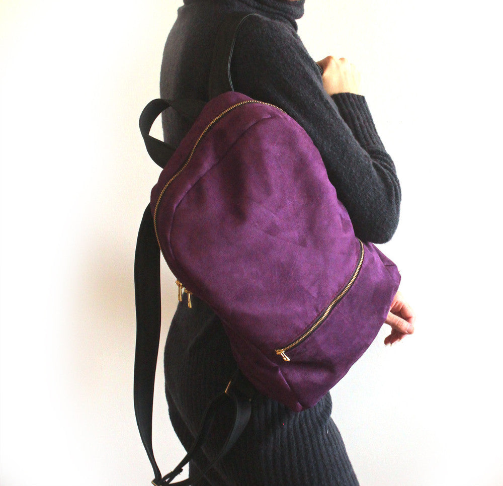 purple backpack leather