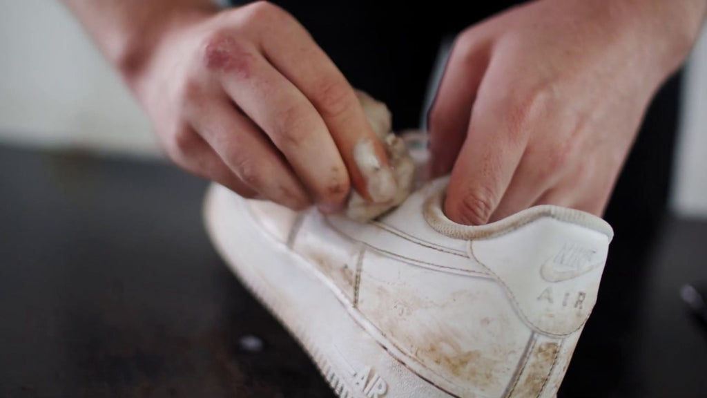 hand washing white nike shoes