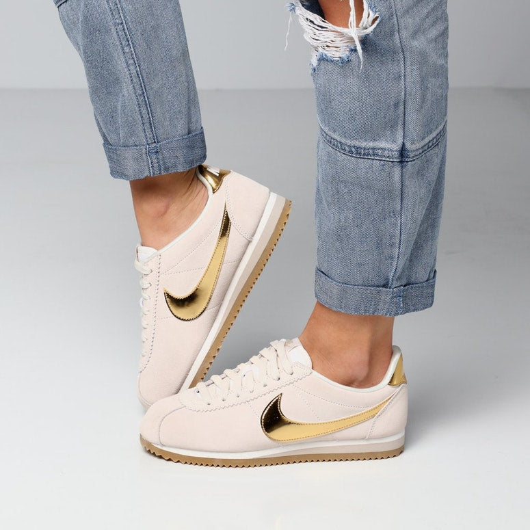 gold nike cortez womens