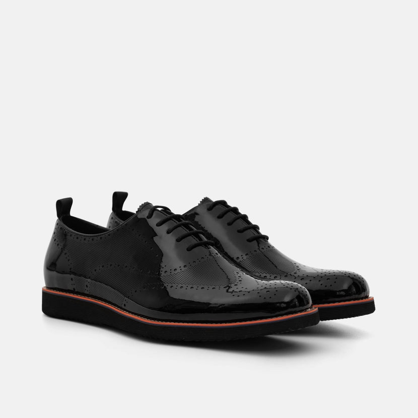 Oscar Black Patent Leather Wholecut Brogue Sneakers by Marc Nolan