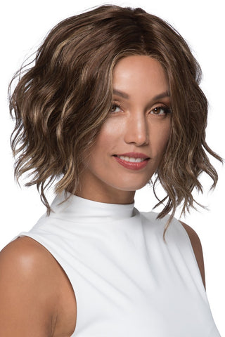 Multi cultural women wearing Haven wig by Estetica, a wavy chin length bob in a highlighted brunette color.