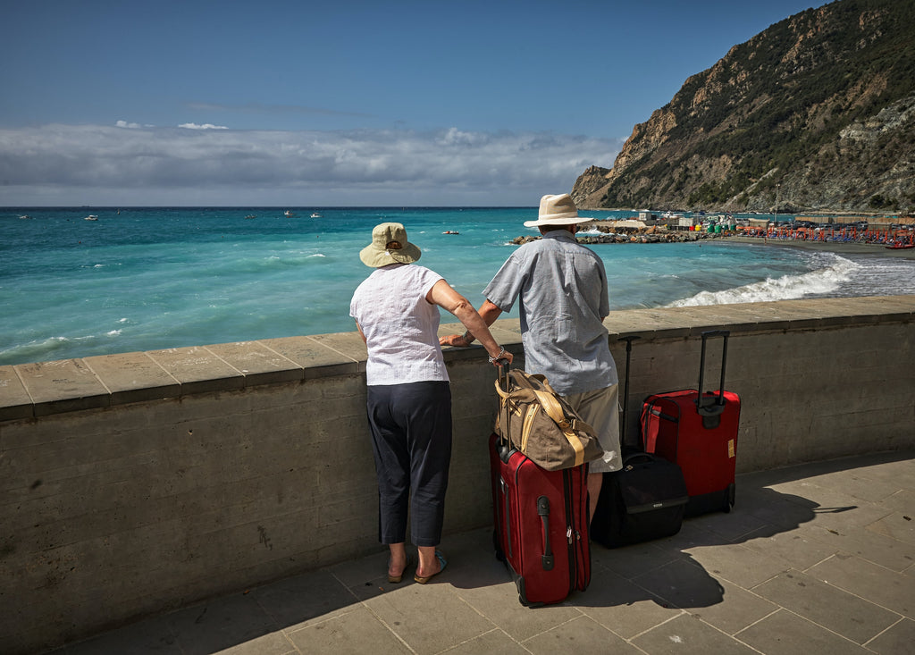 Elderly folks looking out at the ocean