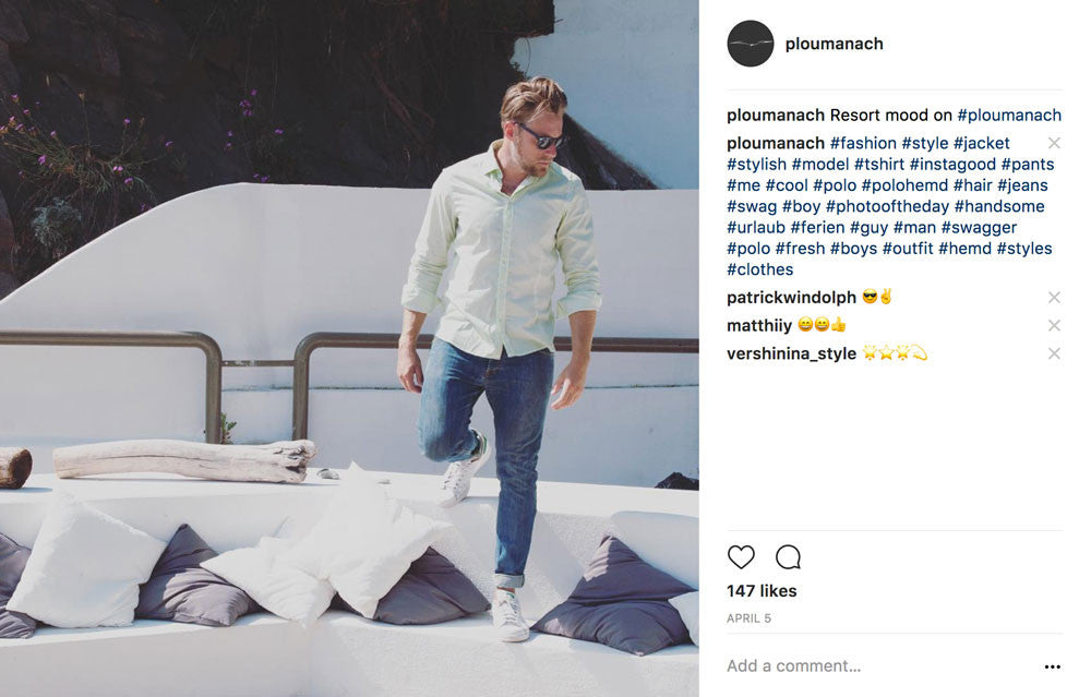 Man stepping on a bench while wearing a light green Ploumanac'h shirt