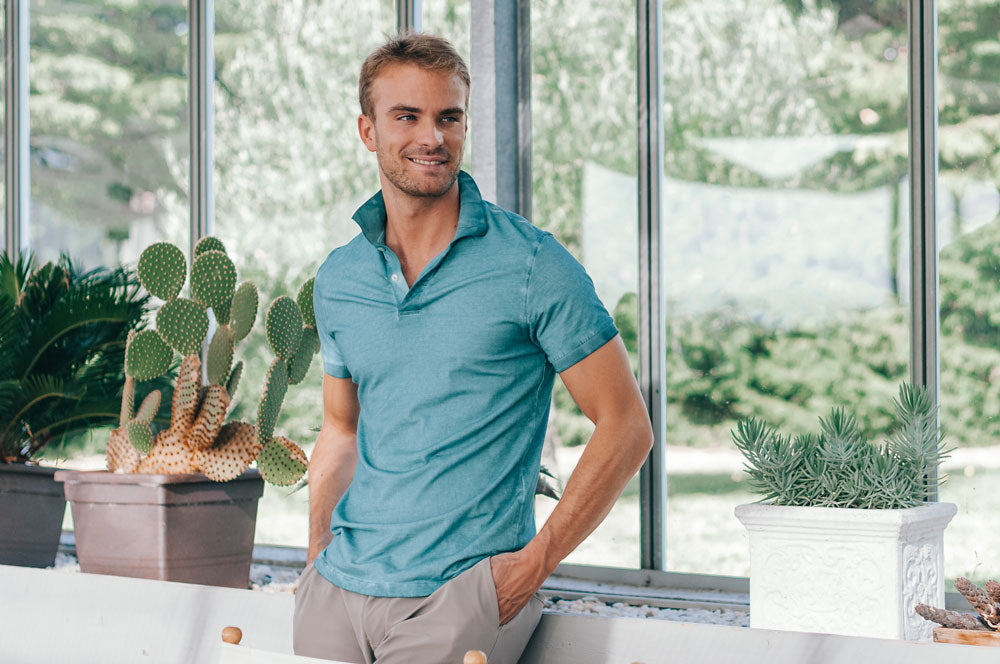 Man wearing a tile polo shirt during a business casual day at the office