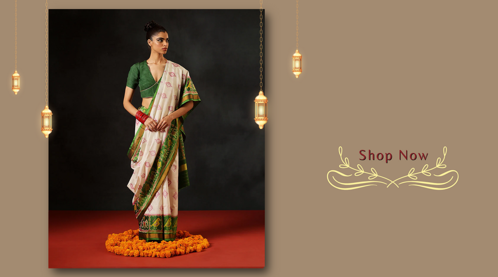 Handloom_Green_And_White_Pure_Mulberry_Silk_Single_Ikat_Patola_Saree_With_Tissue_Border_WeaverStory