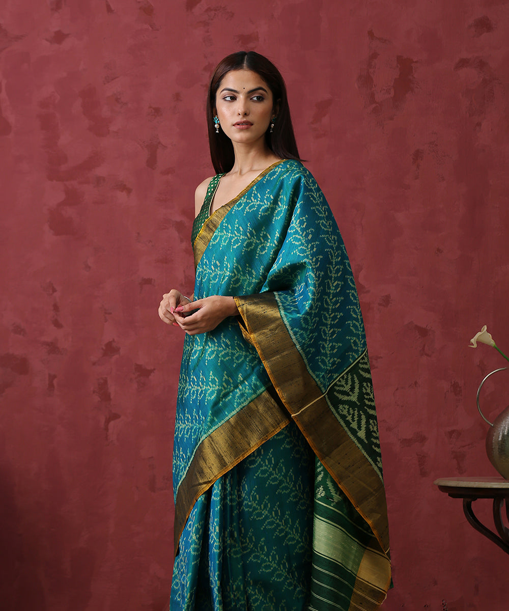 Handloom Peacock Green Raw Silk Patola Saree with Green Pallu - WeaverStory