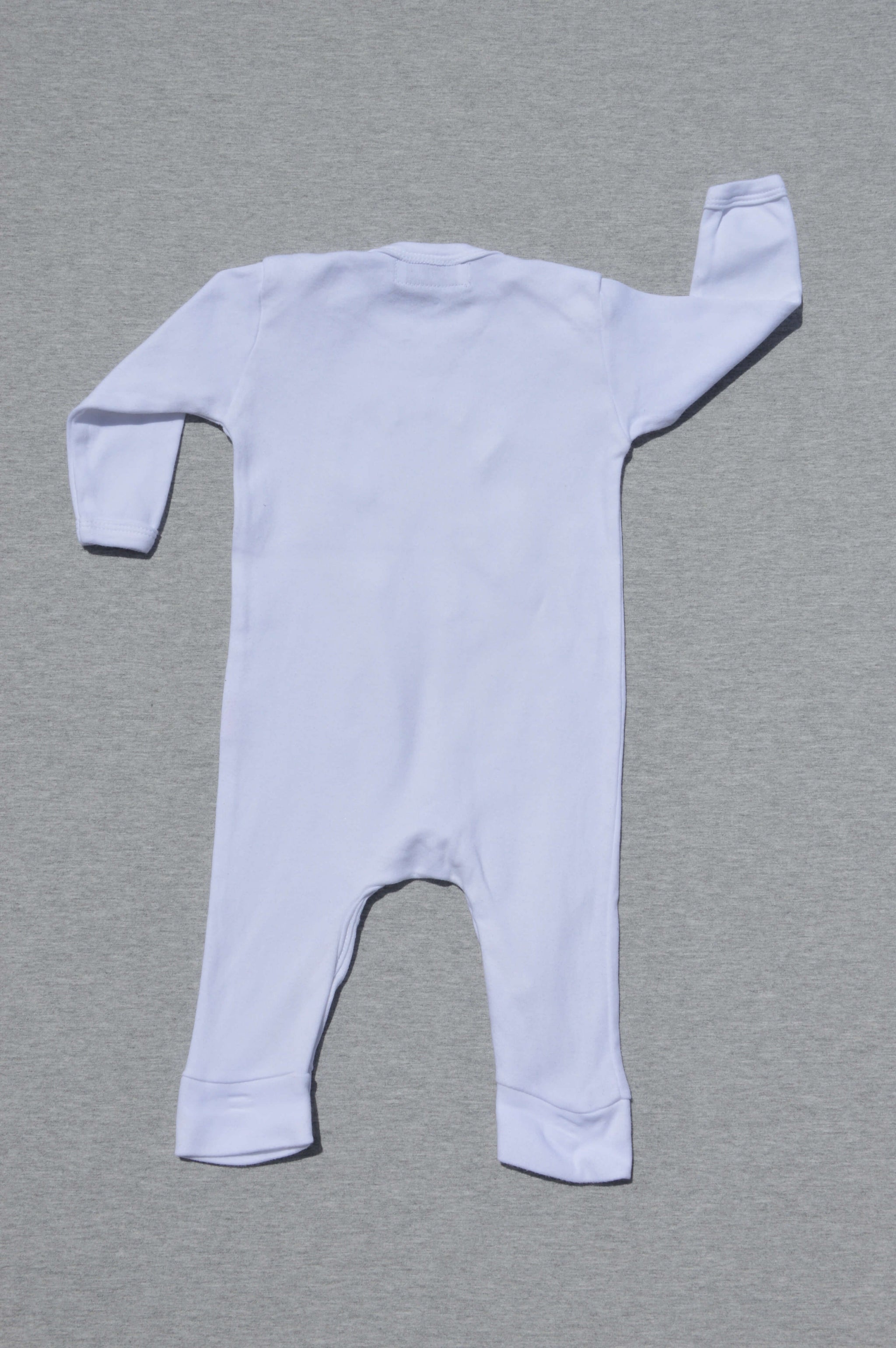 white long sleeve baby onesie