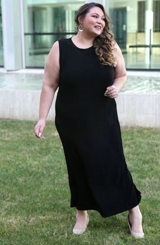 woman wearing a black sleeveless tank dress