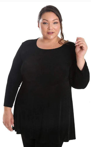 woman wearing a black bias cut tunic