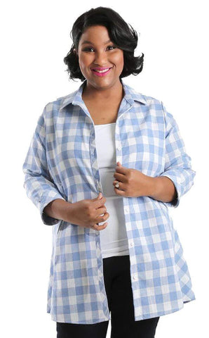 woman wearing a white and blue check a line top