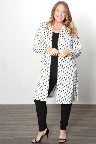 woman wearing a mirage print duster jacket