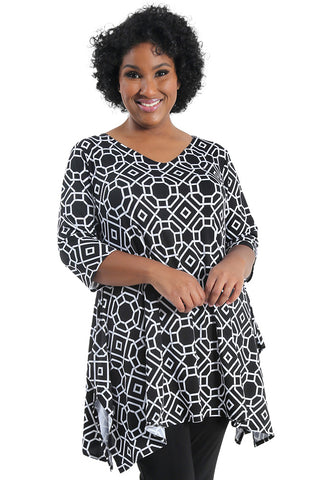 woman wearing a black and white print tunic