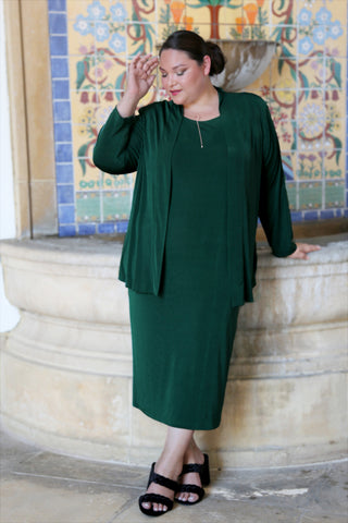 woman wearing hunter green separates